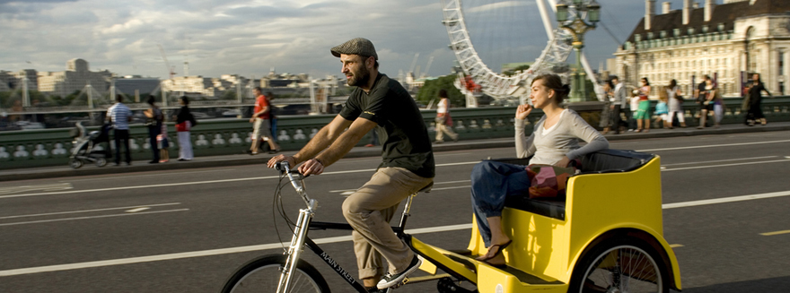 Riding across Westminster bridge on a Bugbugs pedicab