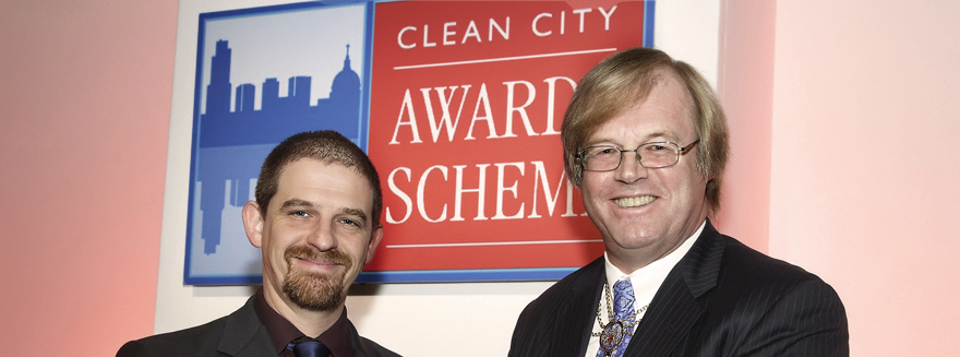 Friedel receiving a Westminster Clean City Award on behalf of Bugbugs
